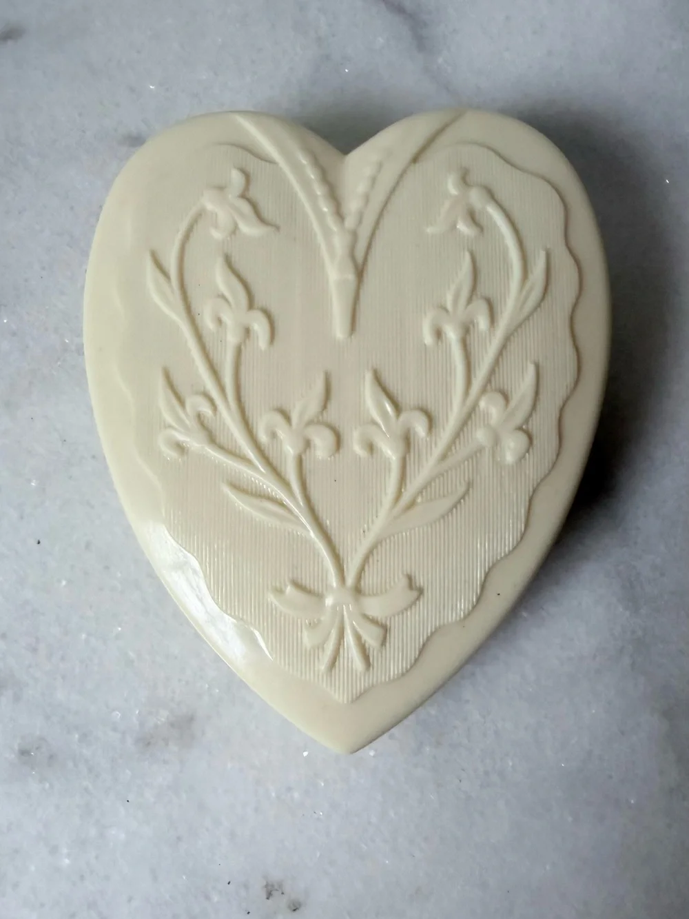 vintage Art Deco-style cream celluloid heart-shaped jewelry box